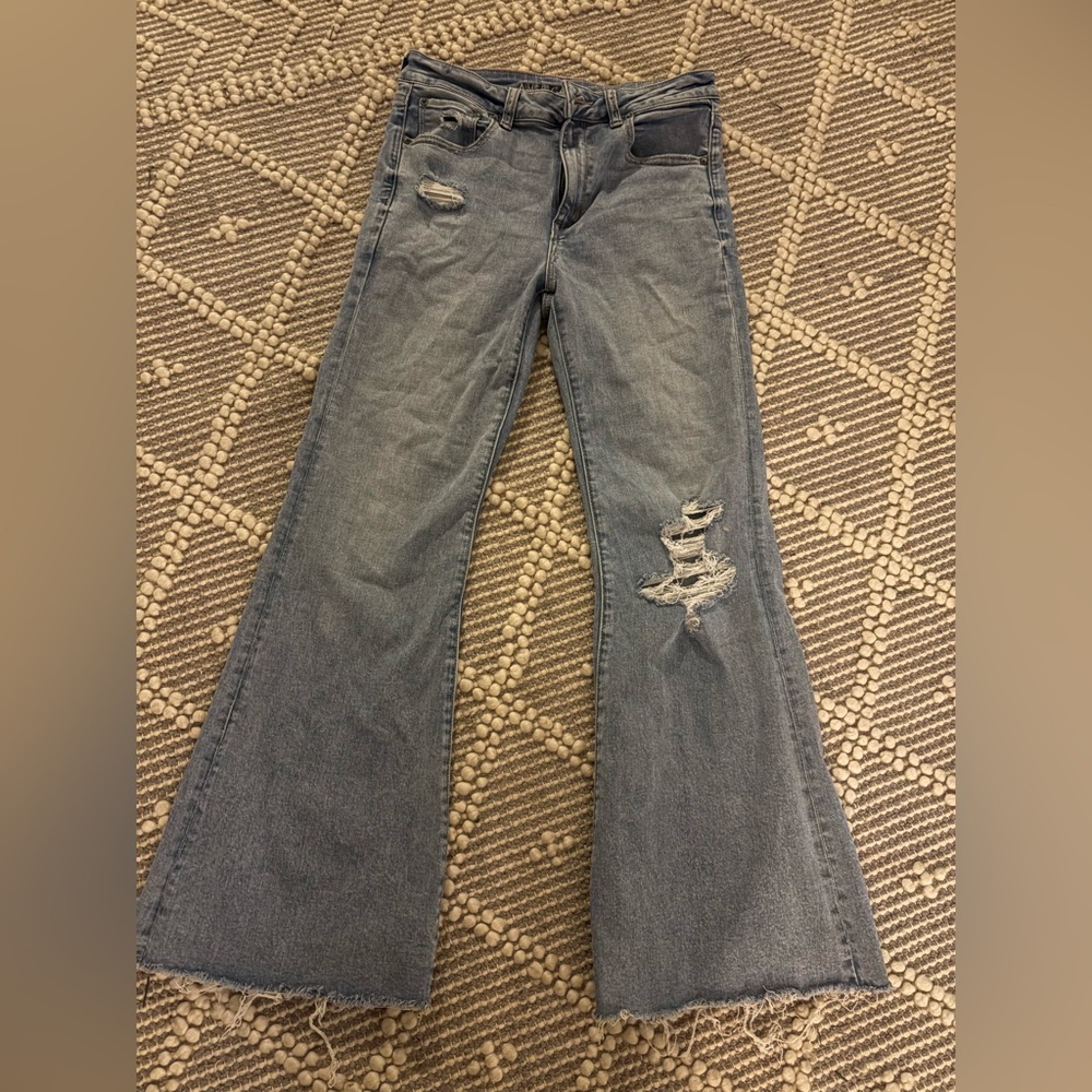 American Eagle Outfitters Light Blue Distressed Flare Jeans. Size 8- Short